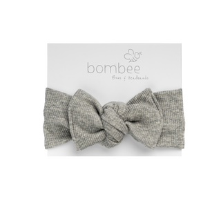 headwrap headband made out of the softest fabric, tie on top to adjust your baby's head. Perfect bow!