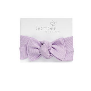 headwrap headband made out of the softest fabric, tie on top to adjust your baby's head. Perfect bow!